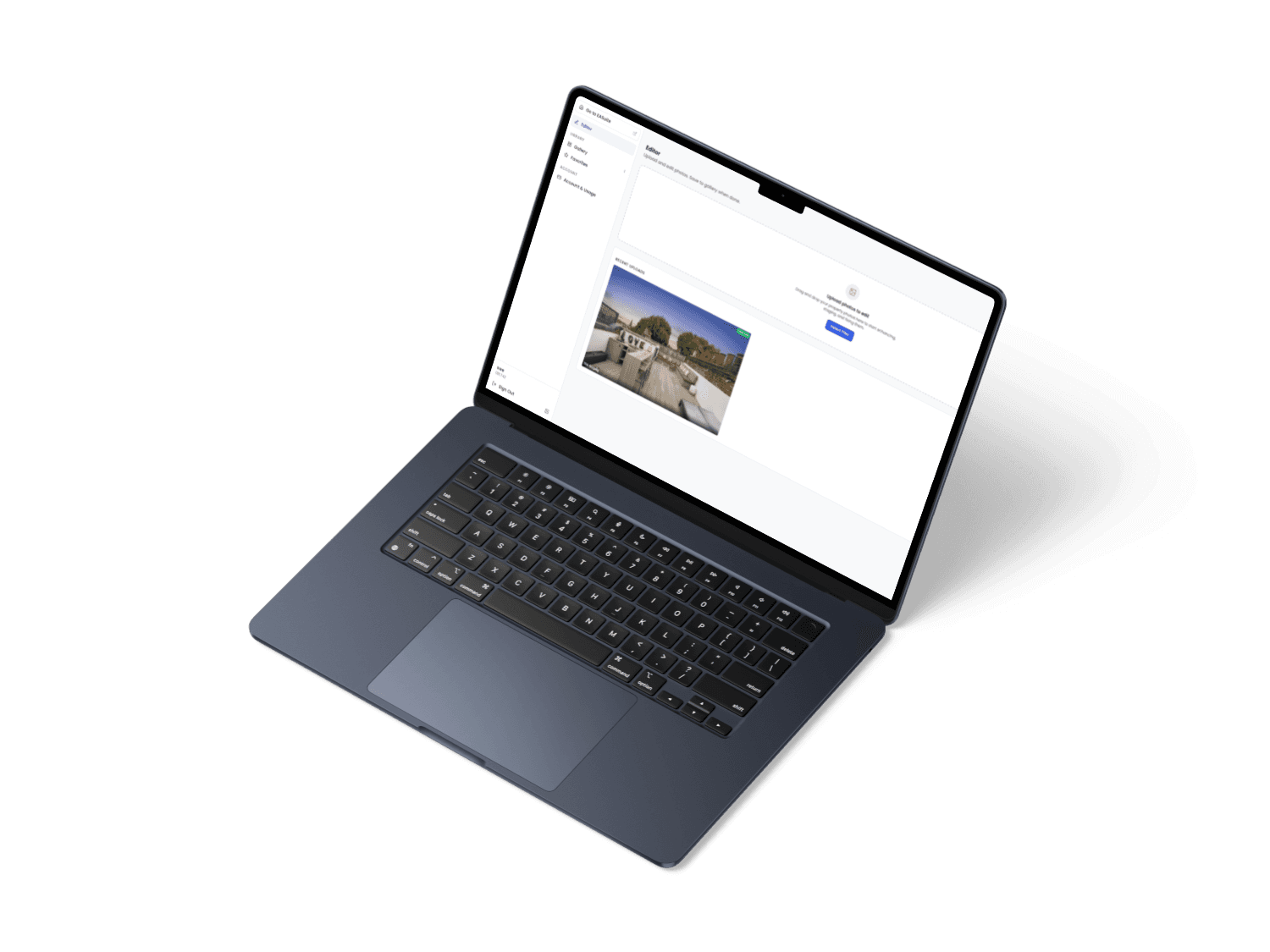 The Photo Enhancer editor with a property photo open, on a laptop